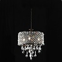 lustre en cristal 4 lumieres en metal chrome de luxe.