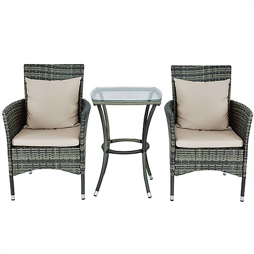 

3 предмета серо-коричневые стулья из ротанга и стол с подушками