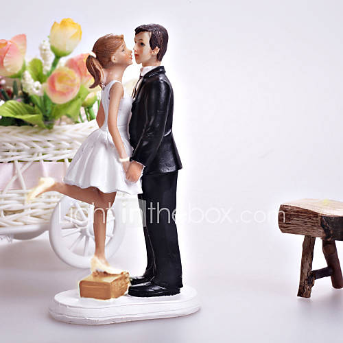 A Kiss And Were Off Wedding Cake Topper